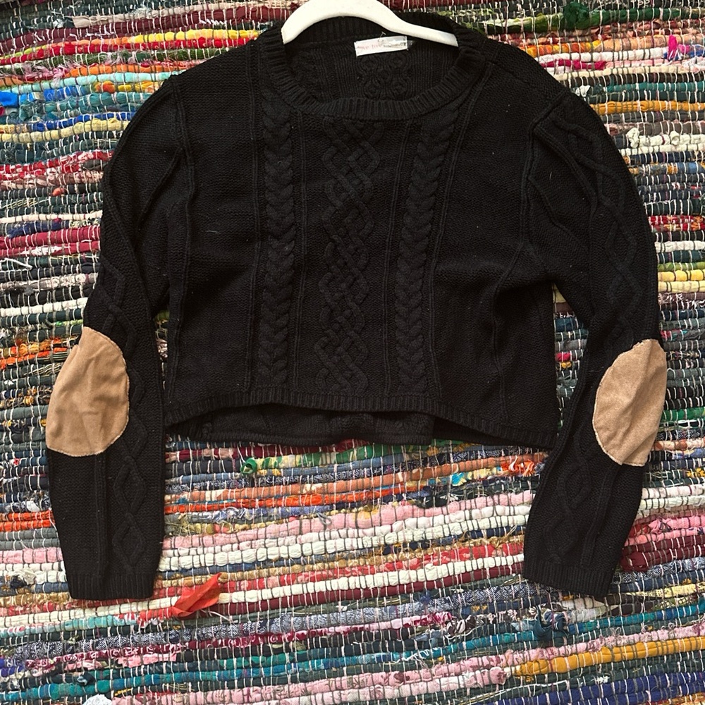 Black sweater with tan elbow patches